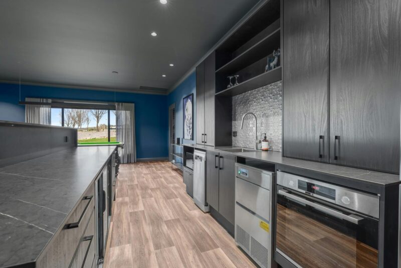 Large kitchen with appliances and amenities