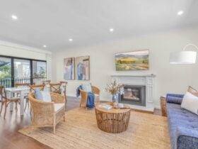 Formal and comfortable loungeroom with tv