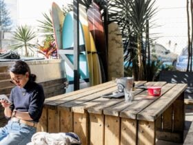Woopi Backpackers outside table
