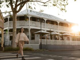 Woman crossing the road in Alstonville