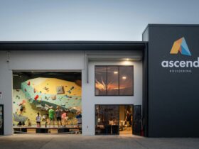 It is a picture of ascend Bouldering venue on dusk taken from outside the building.