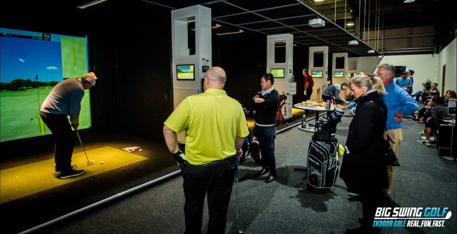 Man Swinging a golf club