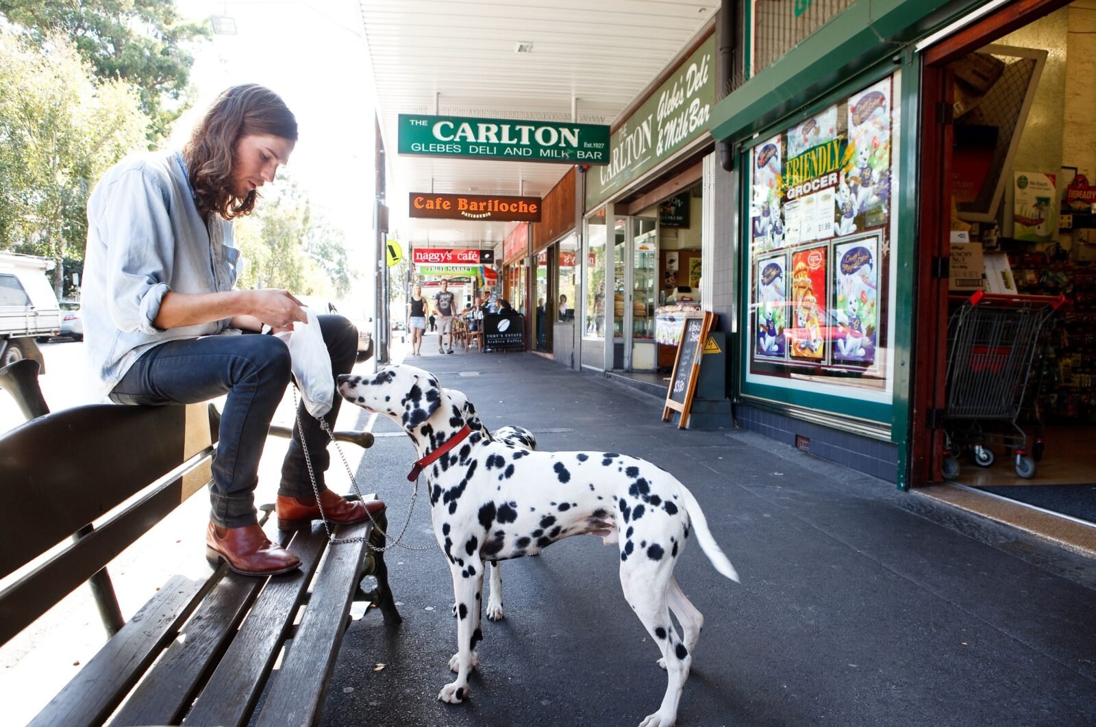 Man with his dog on Glebe Point Rd, Glebe