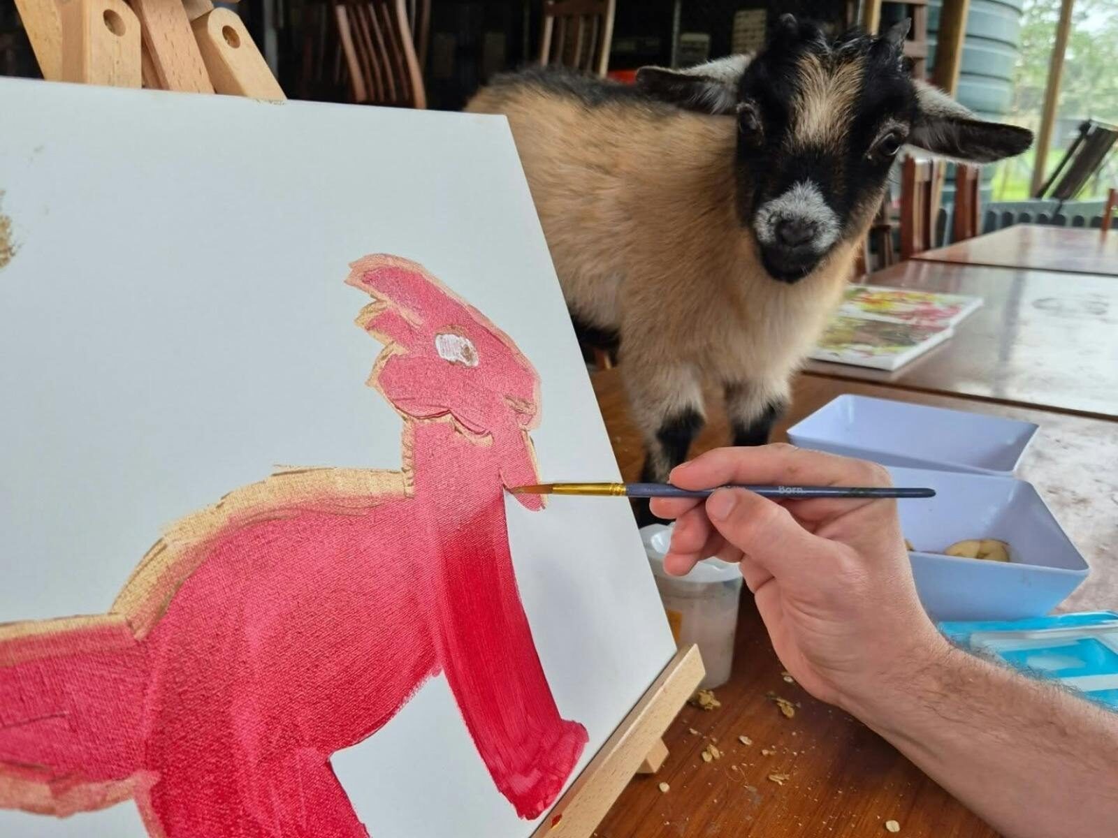Painting a miniature goat