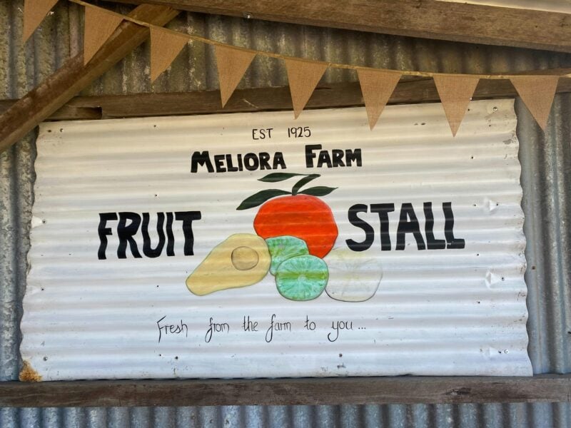 Meliora Farm fruit stall sign at welcome shed