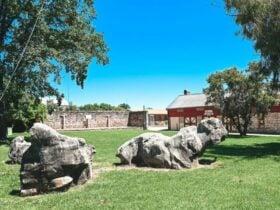 Image of Village Green with large rocks in forefront