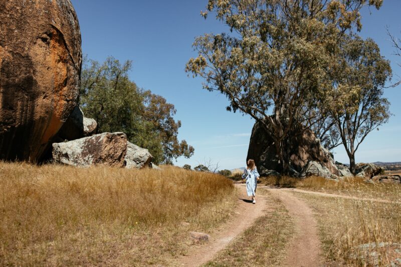 Lady walking towards camera looking at the lookout