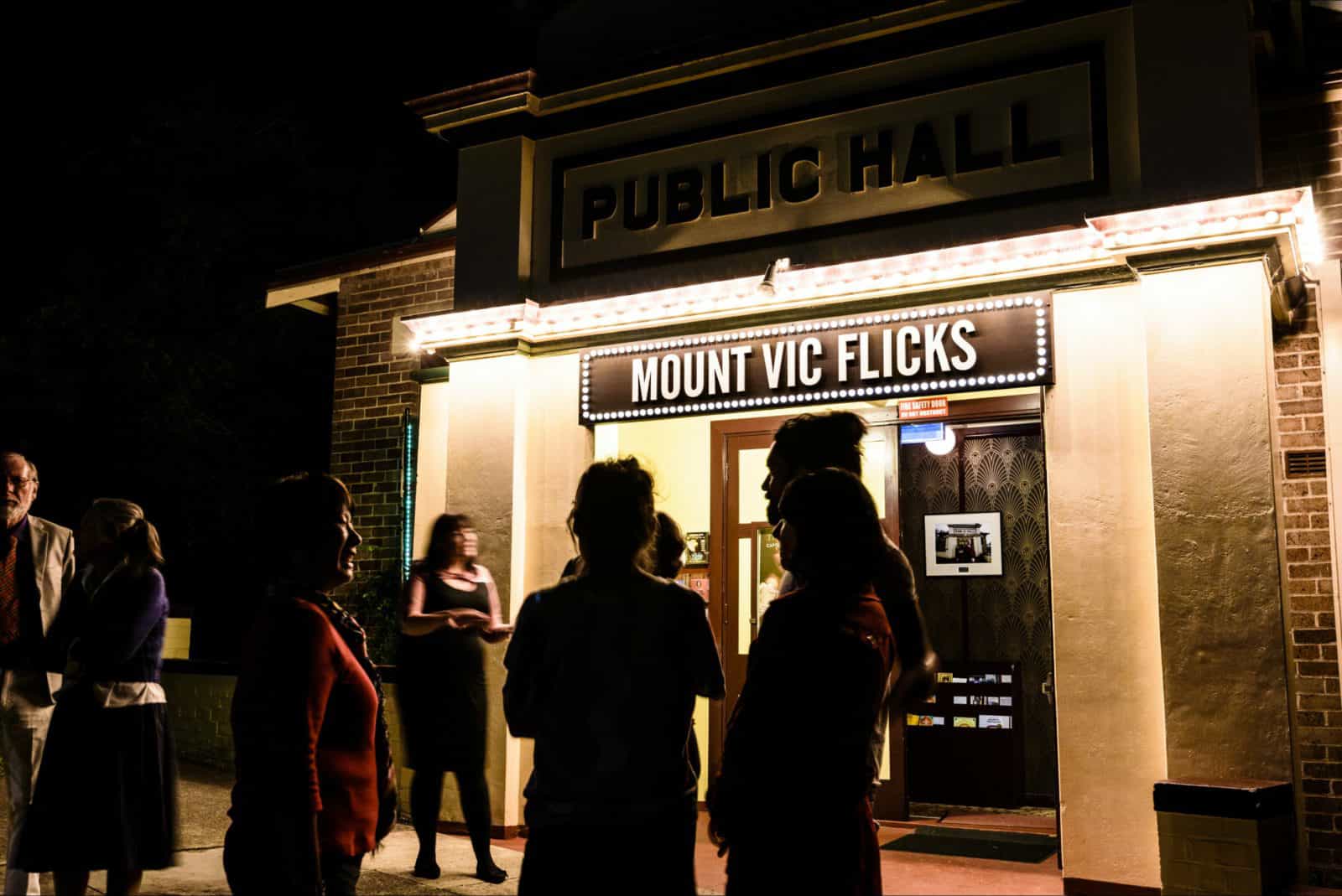 Mount Vic Flicks at night.