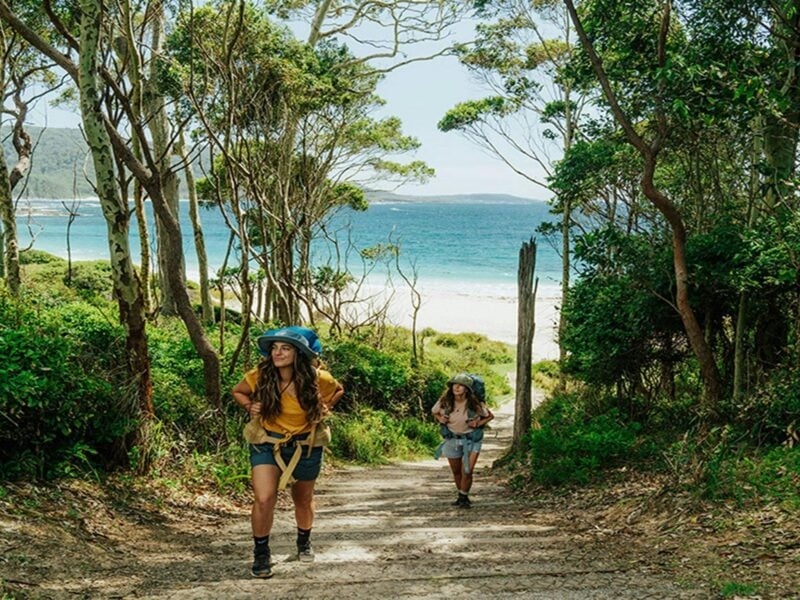 Walkers on the Murramarang South Coast Walk near Depot Beach. Credit: Remy Brand © DCCEEW