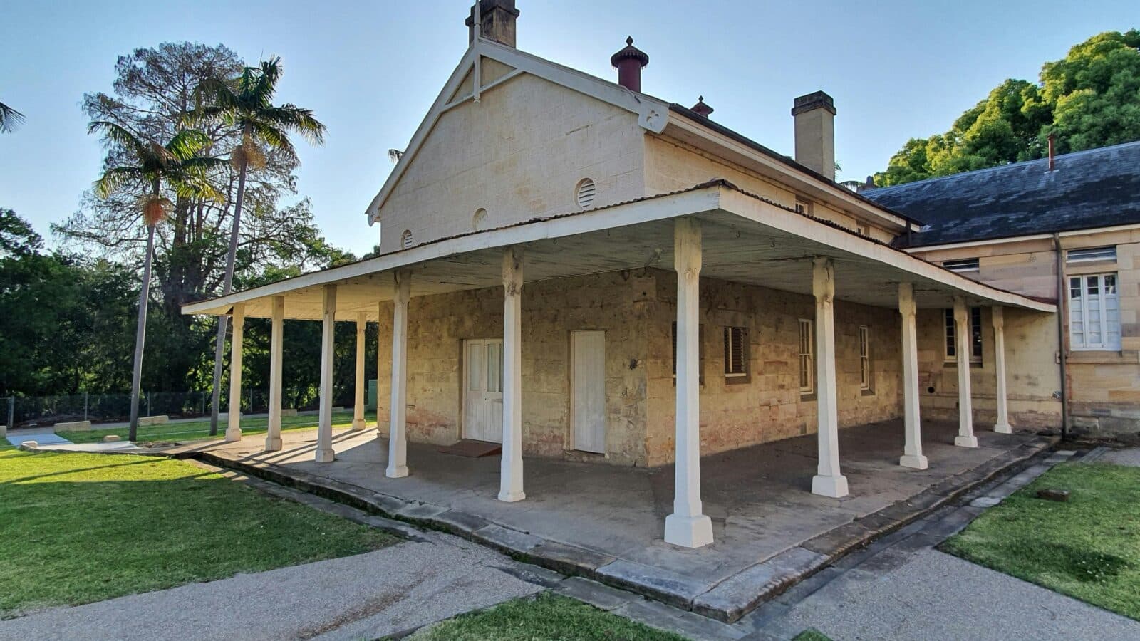 a colonial building with a verandah