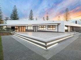 Port Macquarie Observatory exterior showing setting sun in background and staris lit up.