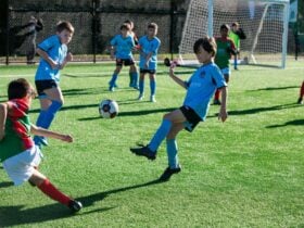 Children playing soccer at Poulton Park.