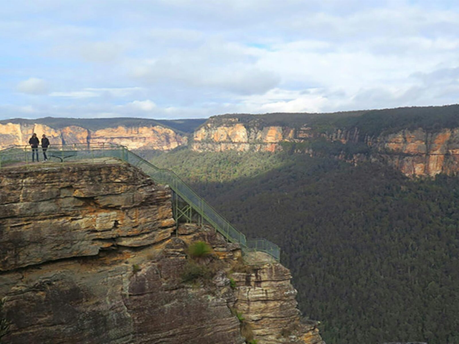 Three people at Pulpit Rock lookout