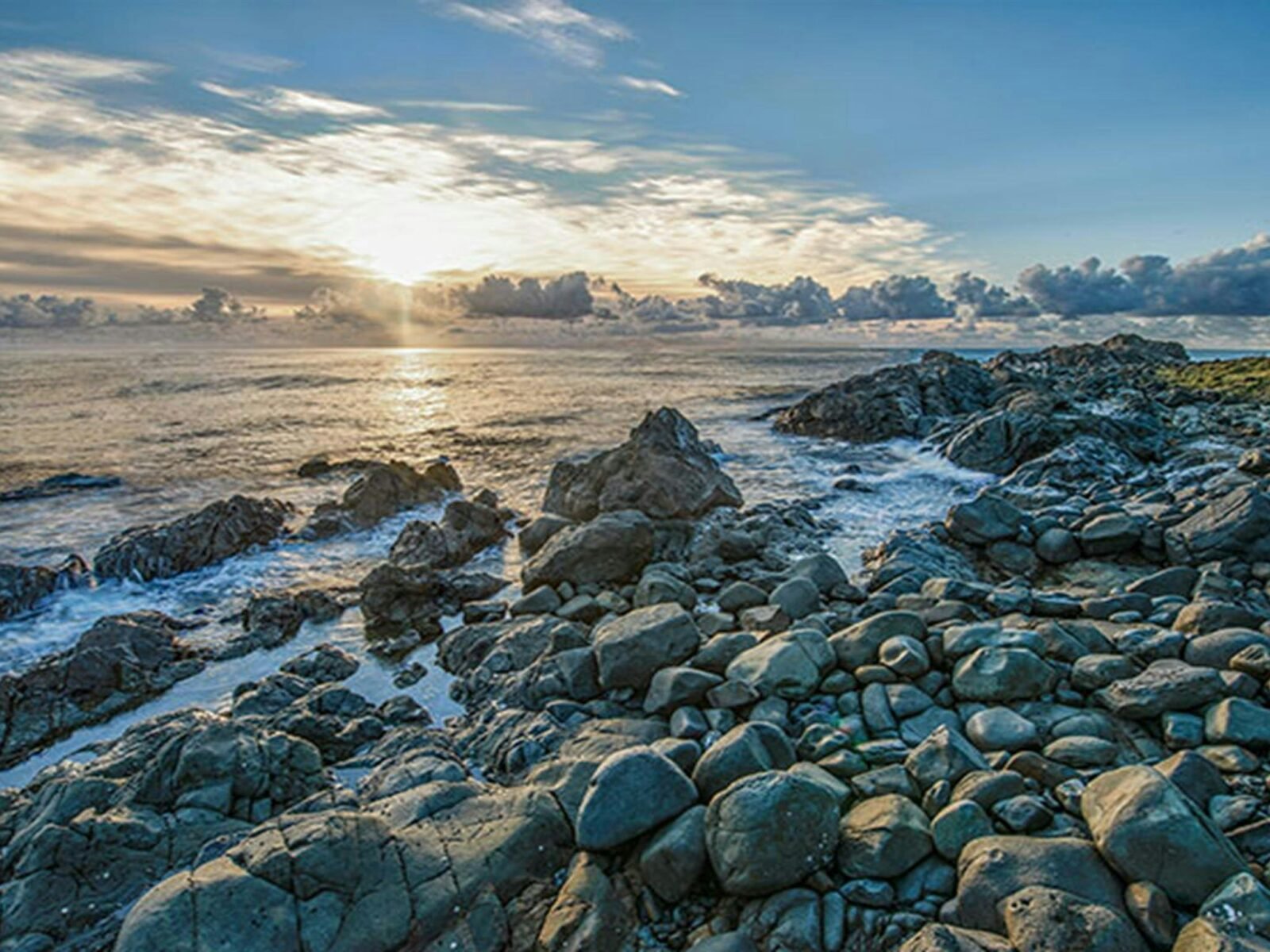 Sunrise over Saltwater National Park's coastline. Photo: John Spencer/OEH