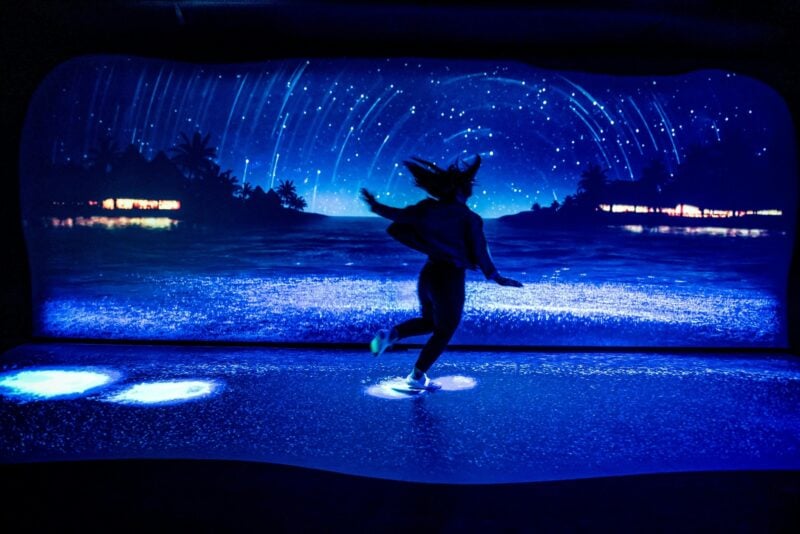 A bioluminescent ocean glows under guestâs footsteps at 