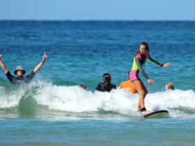 Coaches get as stoked as the participants with riding waves on the Coffs Coast