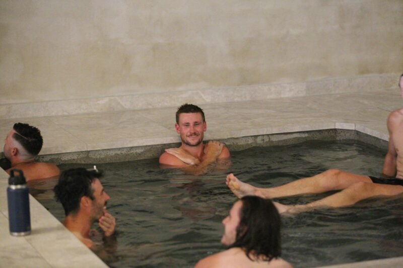 Group of people sitting in a pool