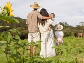 Our family in the sunflower field observing the cattle