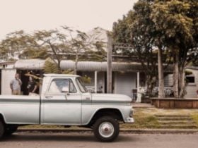 Picture of the shop front with old ute in foreground