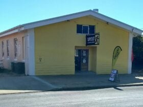 Yellow building with door in the centre