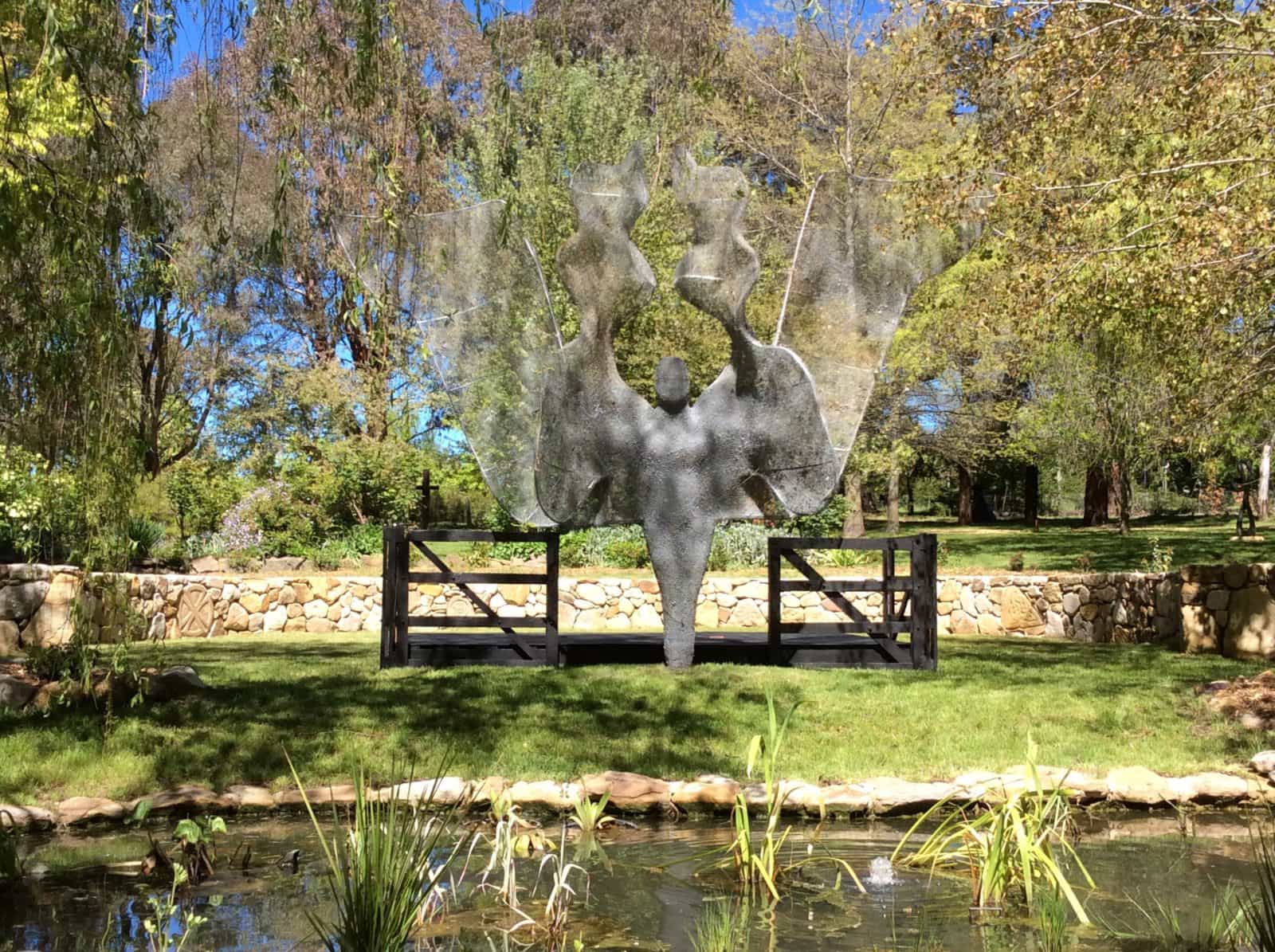 Wire angle sculpture in a garden