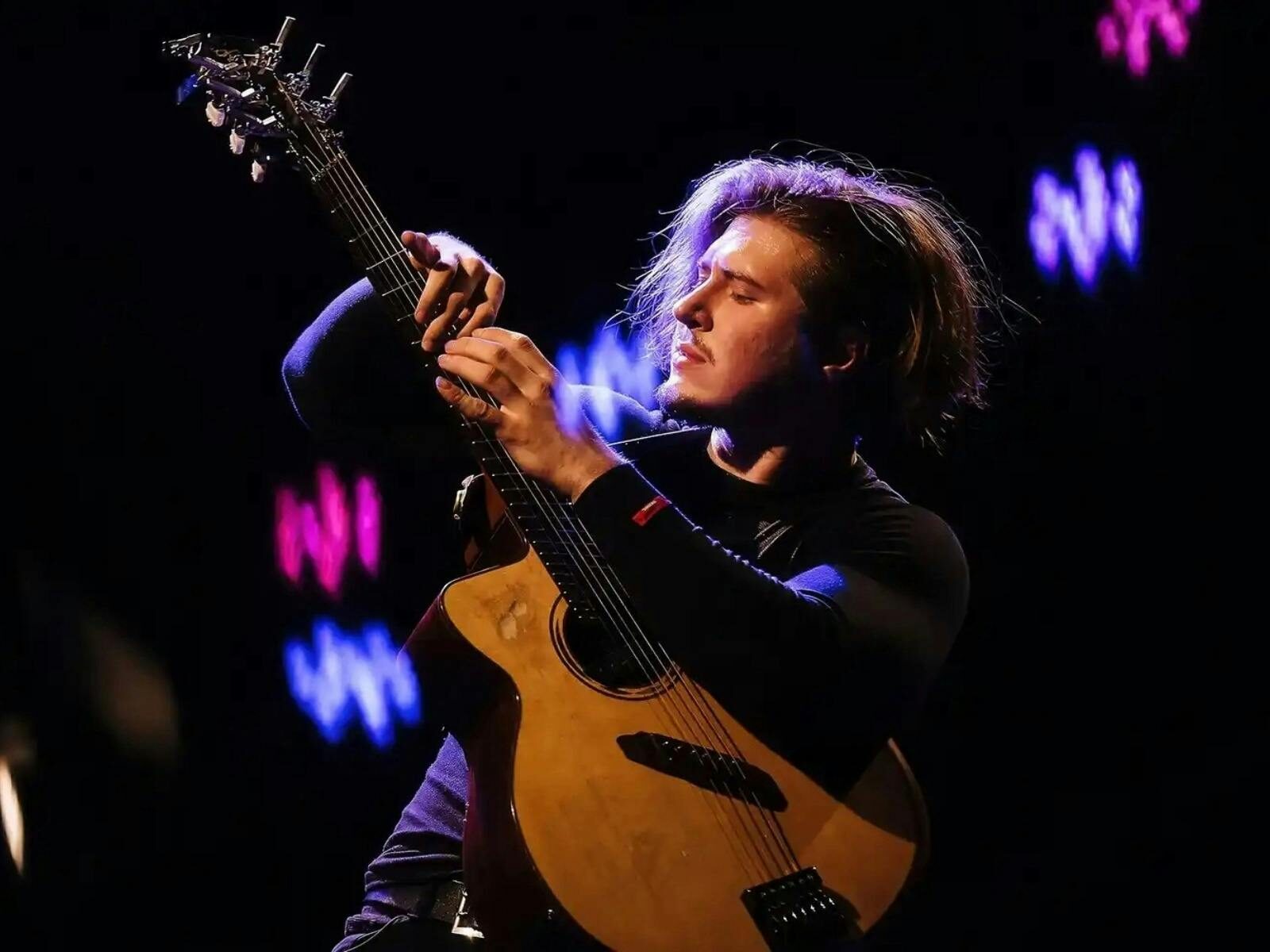 young man with a guitar