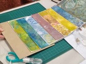 handpainted and stitched artist book pages