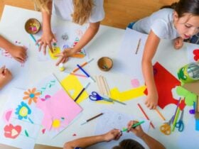 Kids playing arts and craft on a table
