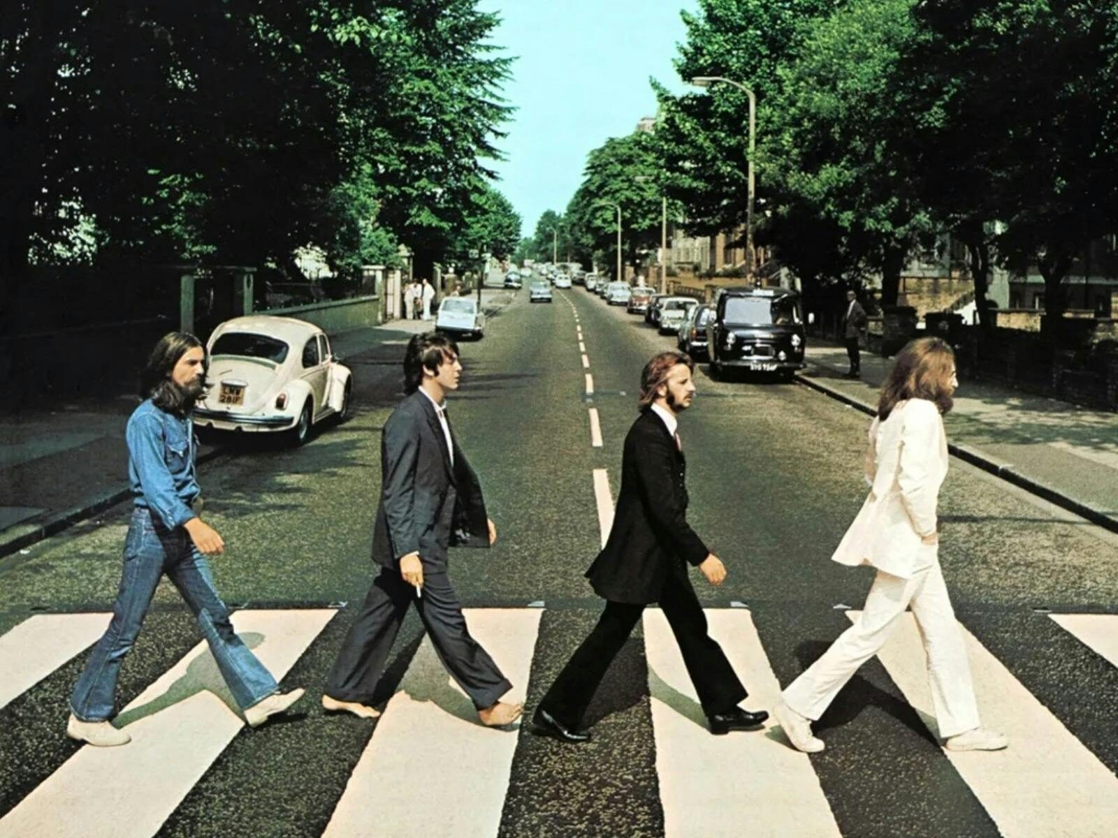 the Beatkes, four men walking across the road