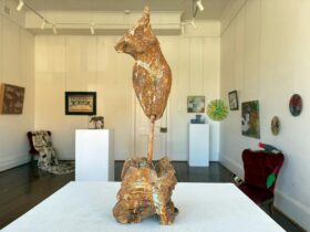 Sculpture in the window of an art exhibition