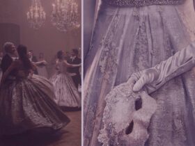 regency ball, couples dancing and a lady in silver holding a masquerade mask