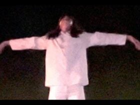 We hover above the ground in hope that we can float (image still from video), 2023