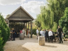 The Butter Factory at Philip Shaw Wines- A rustic wooden open covered area surrounded by trees
