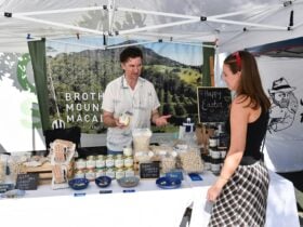 Stallholder selling his product at Green Square Markets