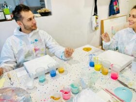 a couple enjoying the fluid art workshop