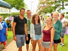 Shopper smiles at Gloucester Farmers Market