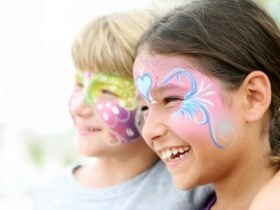 happy children with colourful facepainting