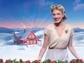 Snowy scene with red house, HOLLYWOODLAND sign, festive garland, and person in silver dress.
