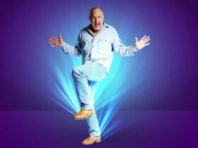 Man Standing on one leg with open hands