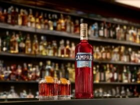 Photo of negroni and Campari bottle