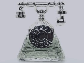 A photo of a telephone-shaped perfume bottle