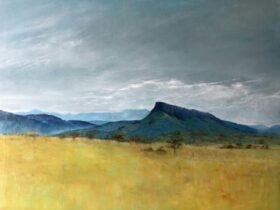 Painting of mountains and clouds