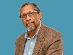 A man with grey hair and beard.