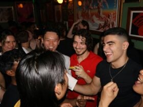 people laughing inside a bat