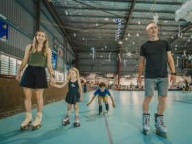 Family rollerskating at Rollerworld