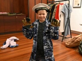 A child participating in the school holiday activity