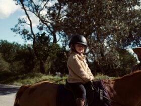 Girl sitting on horse