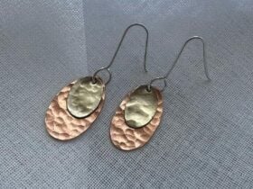 silver and copper disc dangle earrings