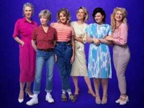 Six women stand side by side in colorful 1980s-style outfits against a purple background