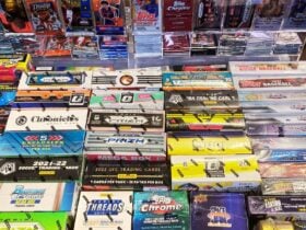 Boxed sports trading cards on table